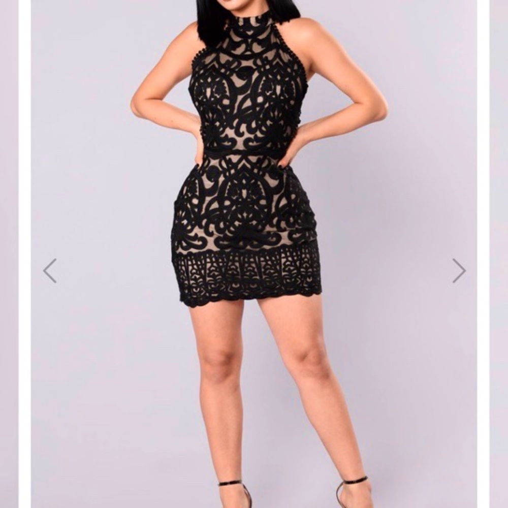 Lace overlay dress with lace up back. Never worn.